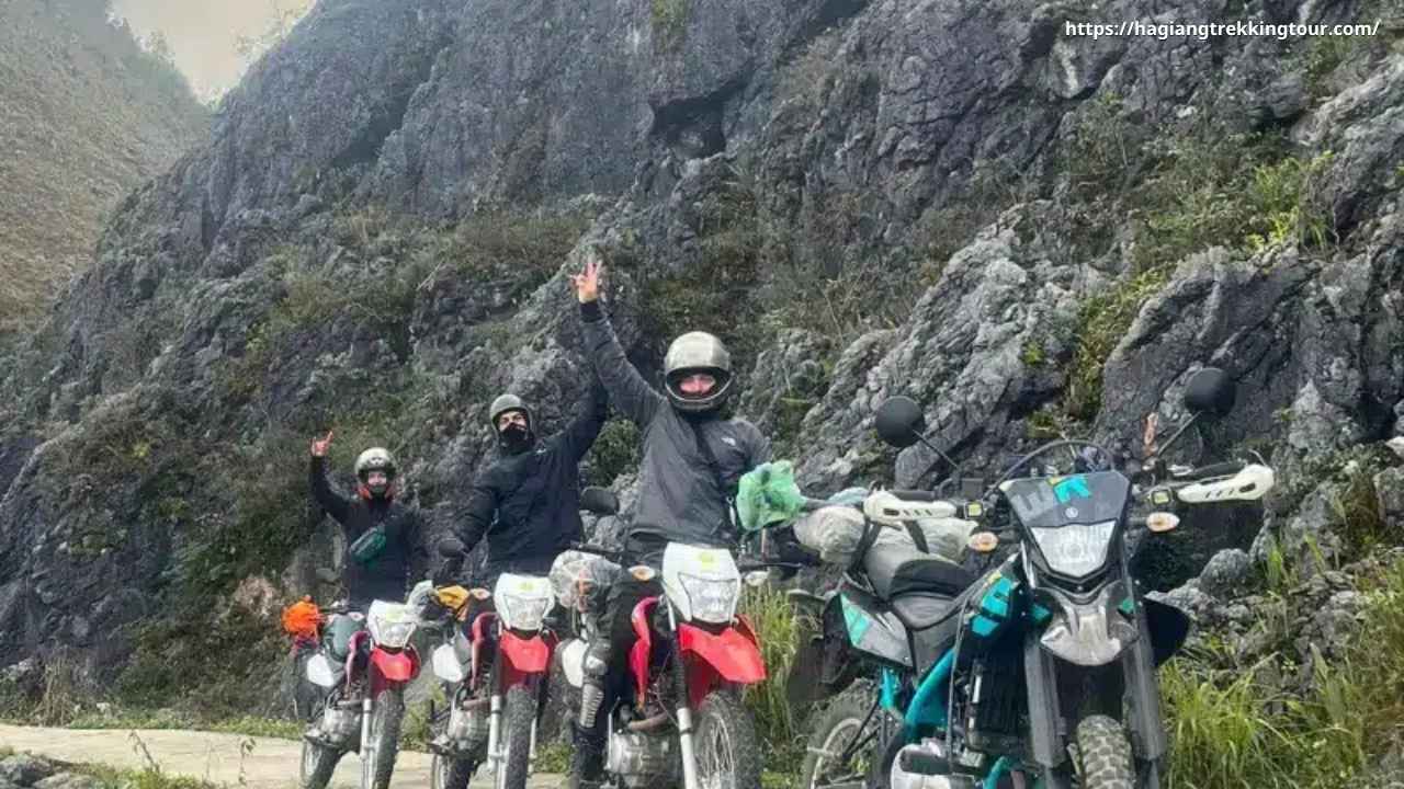 Ha Giang local Easy Rider guide and traveler at ethnic minority village homestay