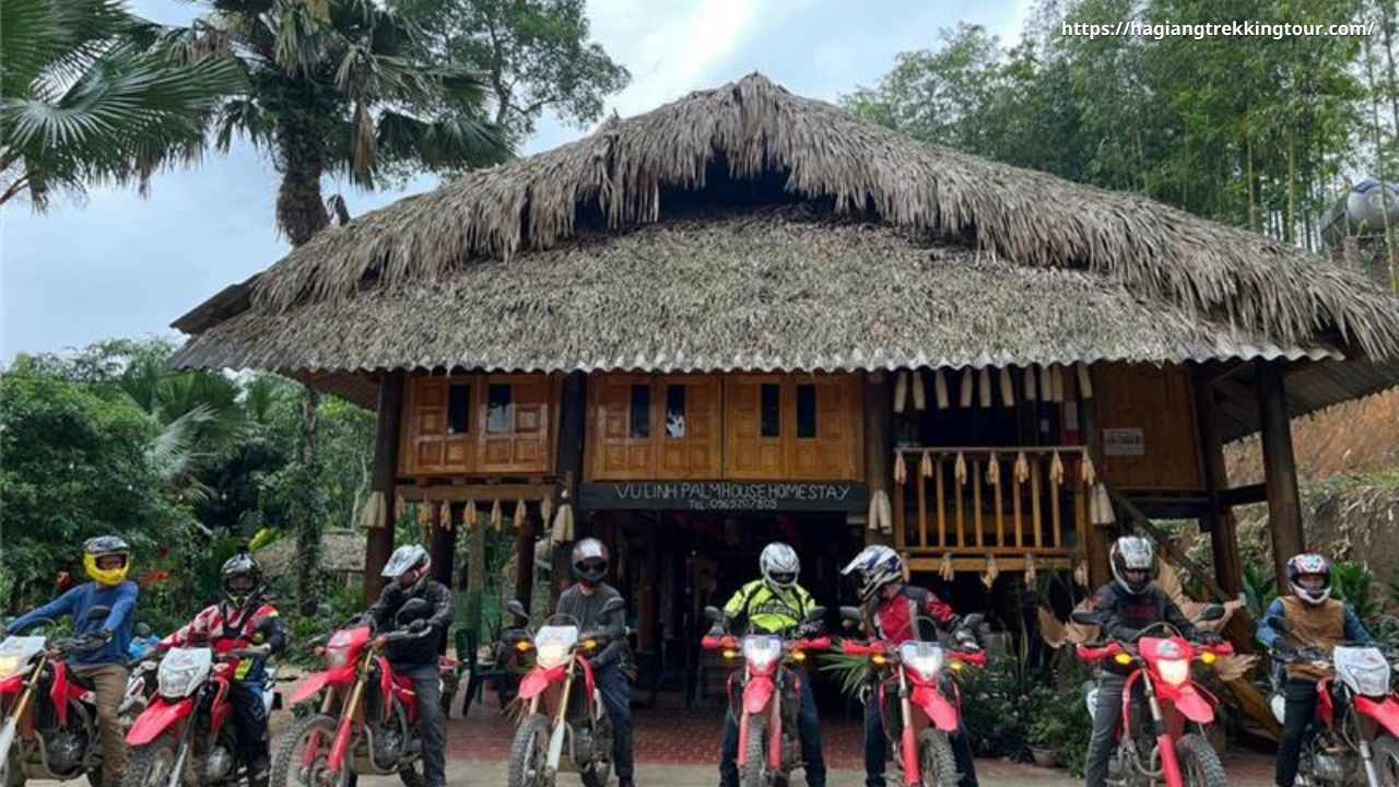 Self-drive motorbike on narrow mountain road in Ha Giang — steep descent with no barrier