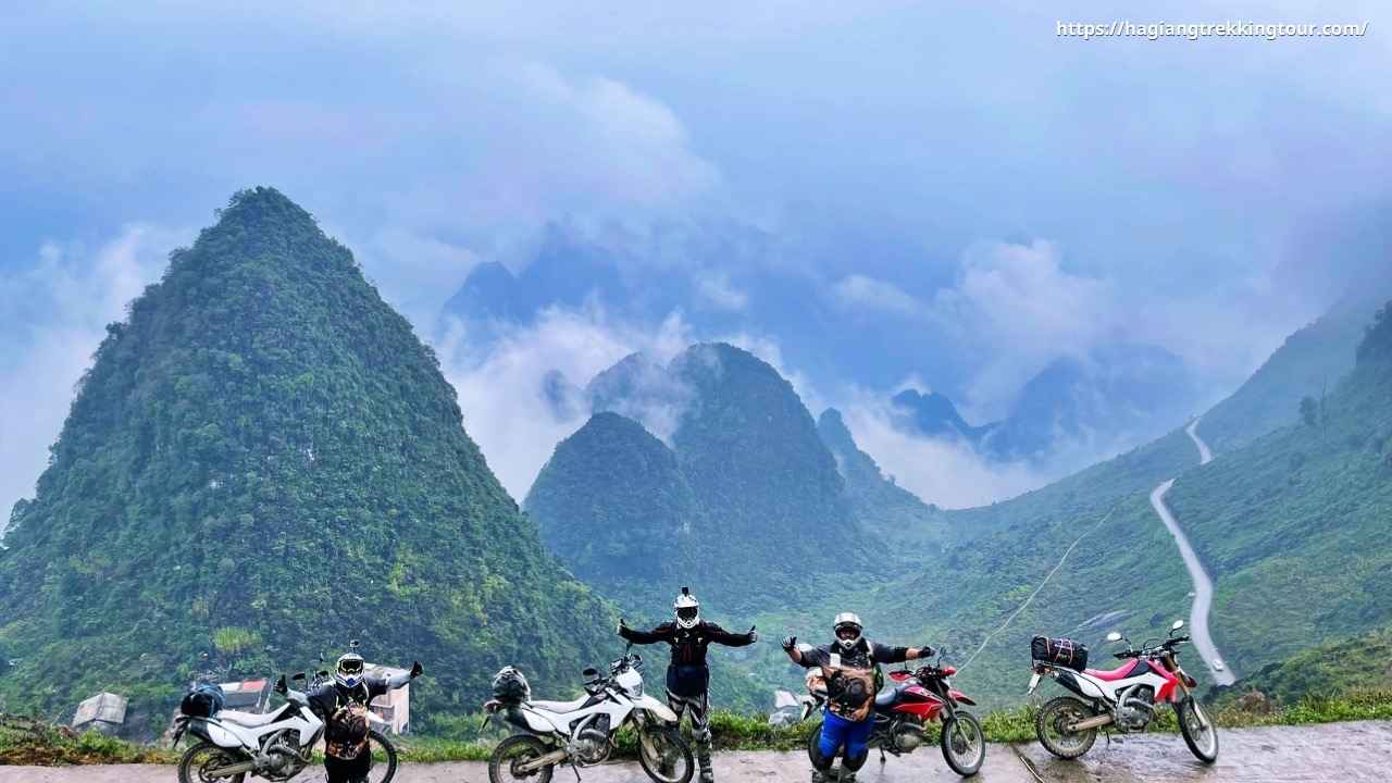 Ha Giang Loop mountain road at Mã Pí Lèng Pass — aerial view of the Nho Que River gorge 1600 metres below