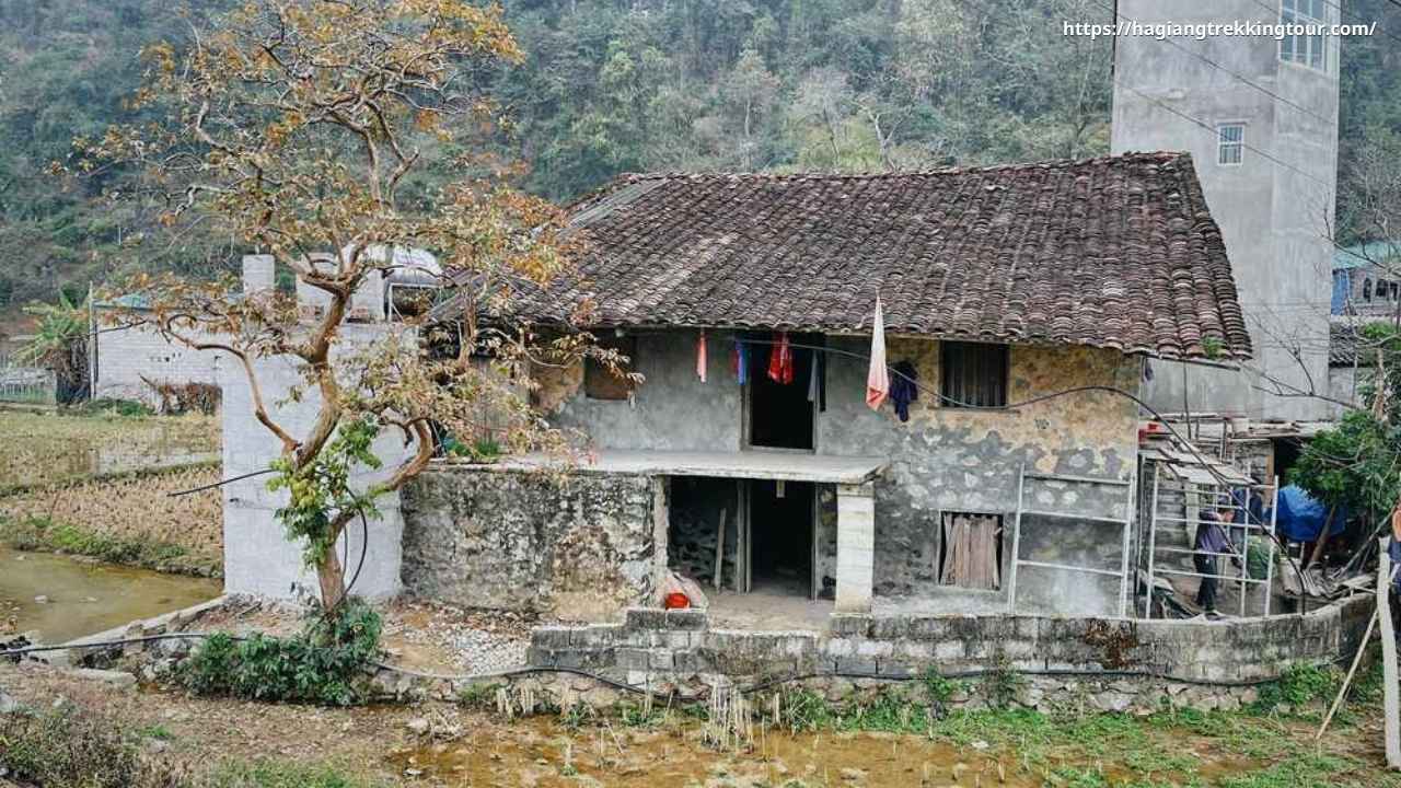 Quay Son River valley approaching Ban Gioc Waterfall — bamboo rafts on emerald water