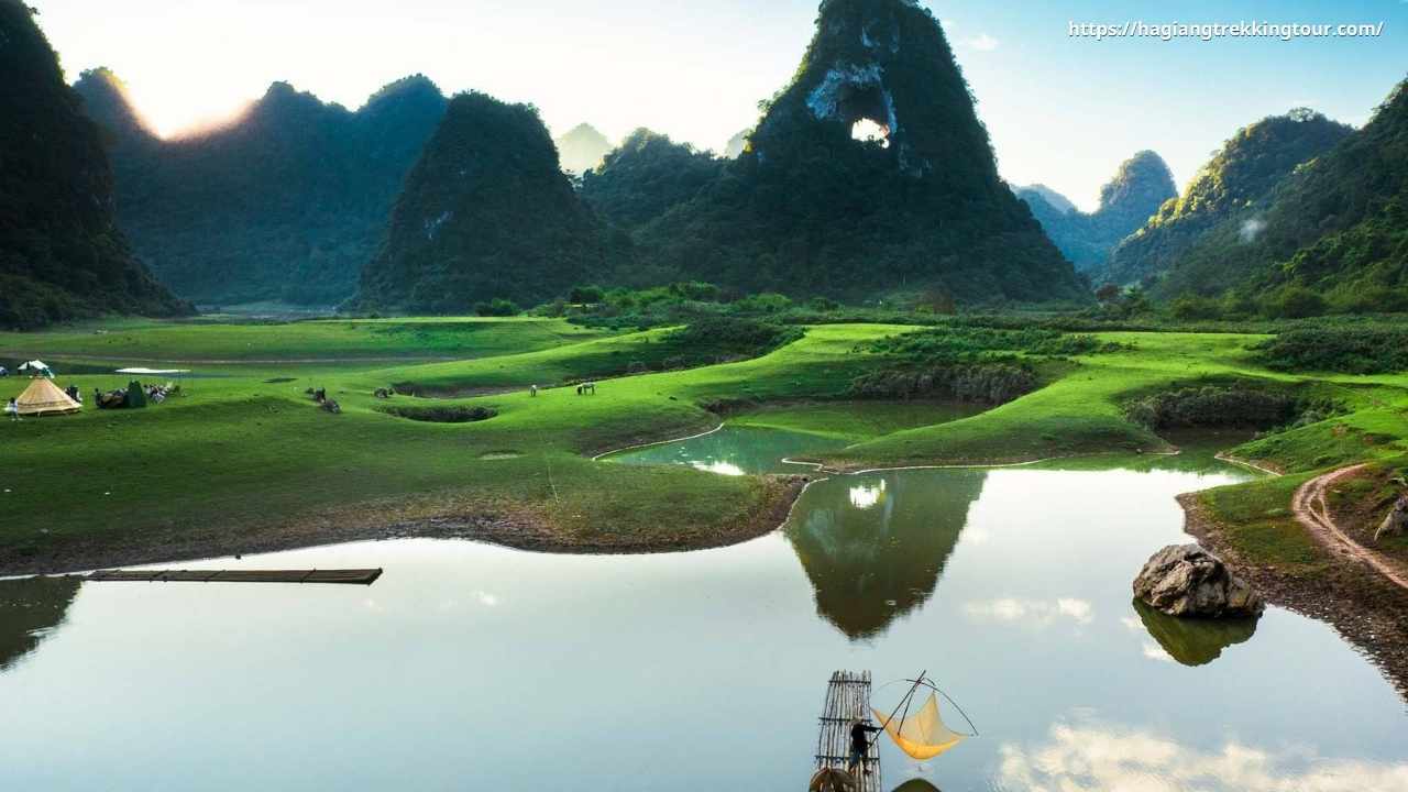 Nguom Ngao Cave near Ban Gioc — stalactite formations illuminated inside the cave system